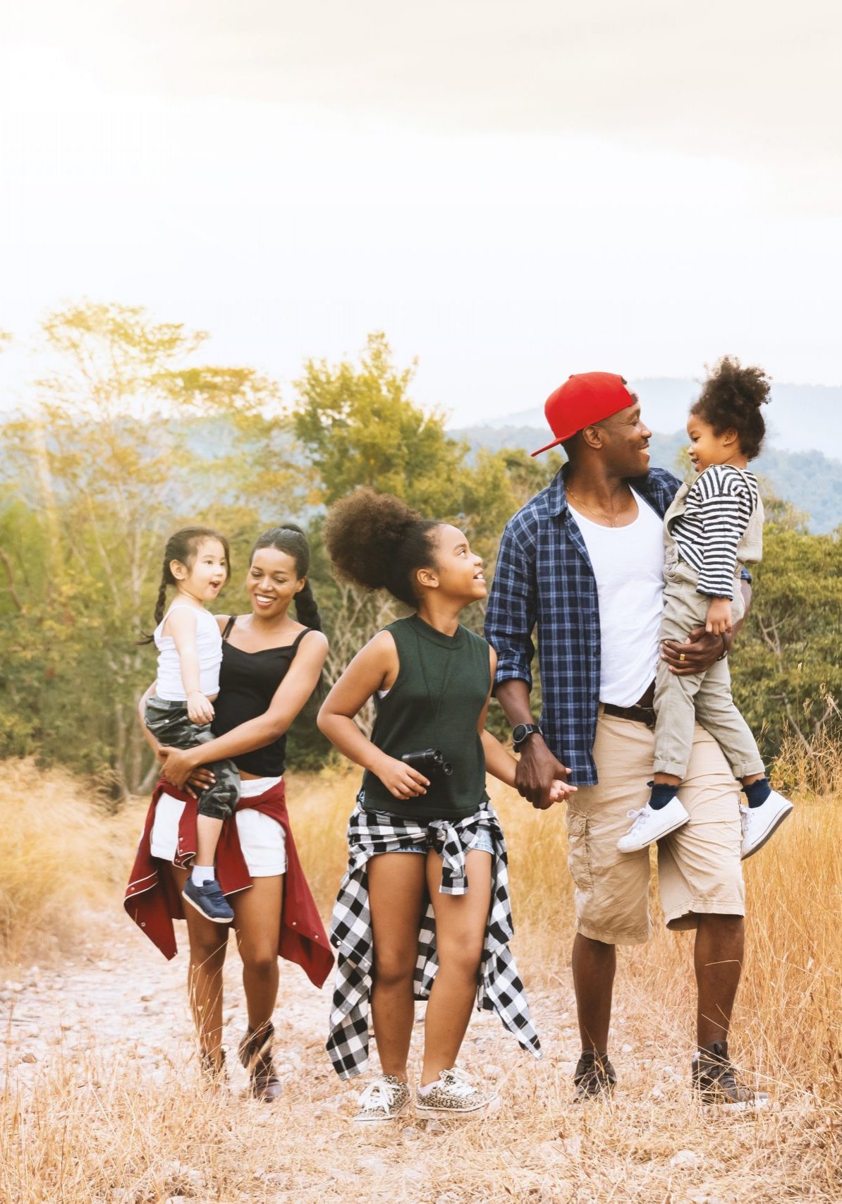 Family hiking foothills