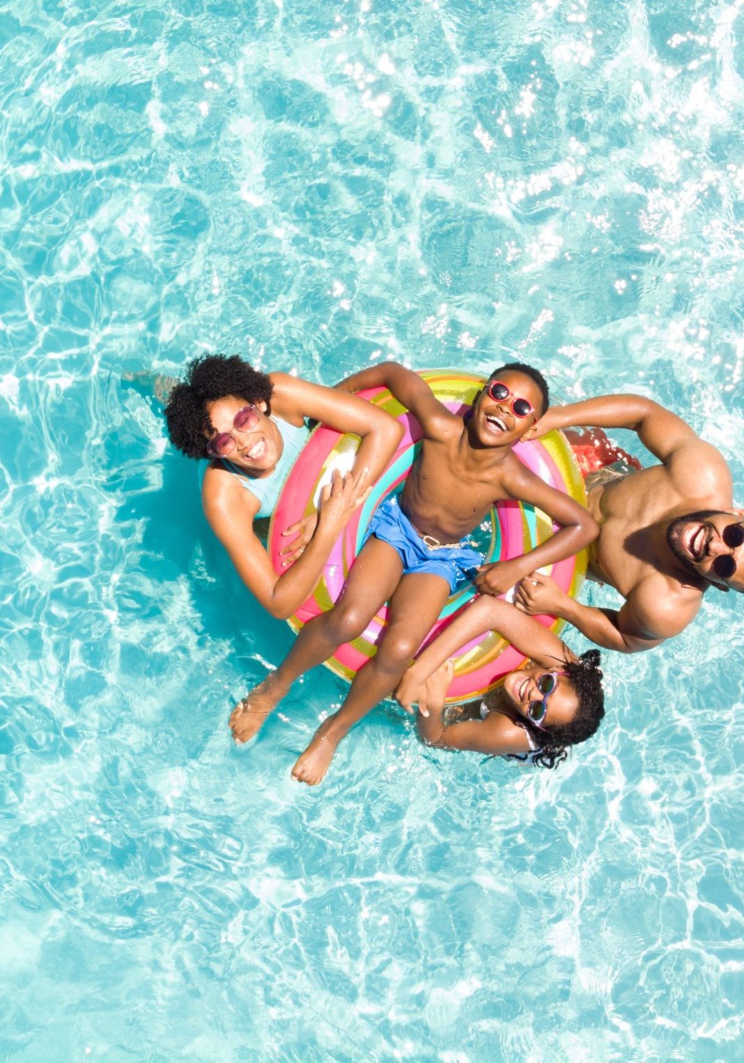 Family in swimming pool